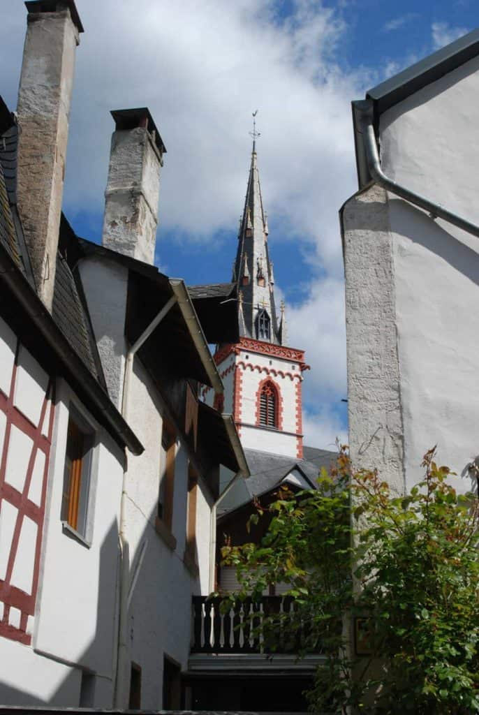old historic church spire and houses in Ediger Germany (Spontanurlaub)